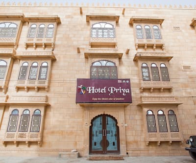 https://imgcld.yatra.com/ytimages/image/upload/t_hotel_yatra_city_desktop/v1390463345/Domestic Hotels/Hotels_Jaisalmer/Hotel Priya/Facade~743.jpg